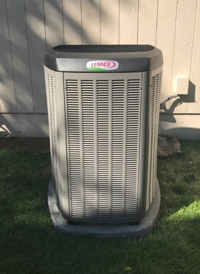 Lennox outdoor condenser at side of home image